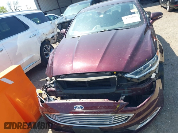 2017 Ford Fusion Titanium with VIN 3FA6P0SU9HR379474, listed as a IAAI auction lot 41979180 with 948,175 mi miles and . Bid and sale history available at DreamBid. Image 13.