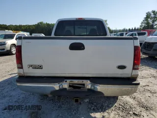 2000 Ford F-250 XL with VIN 1FTNX21F3YEB32295, listed as a Copart auction lot 60867745 with 329,194 mi miles and Salvage title. Bid and sale history available at DreamBid. Image 6.