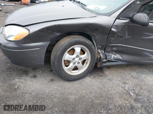 2004 Ford Taurus SE with VIN 1FAFP53254A204492, listed as a IAAI auction lot 41543153 with 70,395 mi miles and . Bid and sale history available at DreamBid. Image 6.