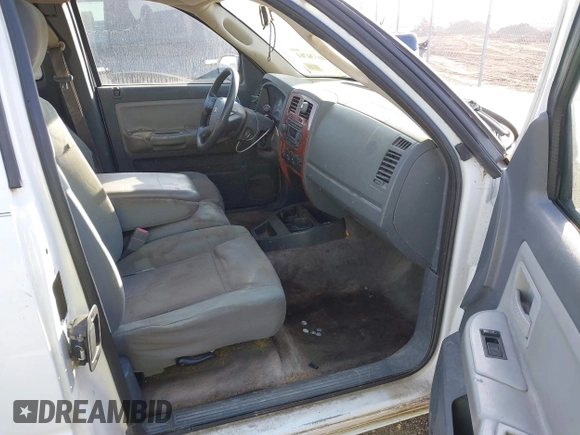 2005 Dodge Dakota SLT with VIN 1D7HE42KX5S251037, listed as a IAAI auction lot 41334761 with 202,865 mi miles and . Bid and sale history available at carsss.com. Image 5.