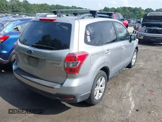 2014 Subaru Forester Premium with VIN JF2SJAGC0EH473208, listed as a IAAI auction lot 42800673 with 186,698 mi miles and . Bid and sale history available at DreamBid. Image 4.