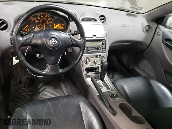 2000 Toyota Celica GTS with VIN JTDDY32T0Y0023275, listed as a Copart auction lot 50836735 with 154,144 mi miles and Salvage Title. Bid and sale history available at DreamBid. Image 8.