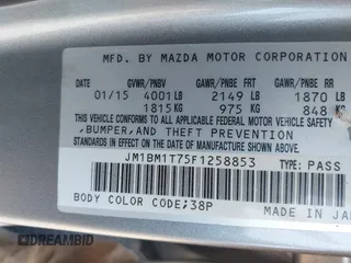 2015 Mazda 3 i SV with VIN JM1BM1T75F1258853, listed as a IAAI auction lot 41279651 with 36,437 mi miles. Bid and sale history available at carsss.com. Image 9.