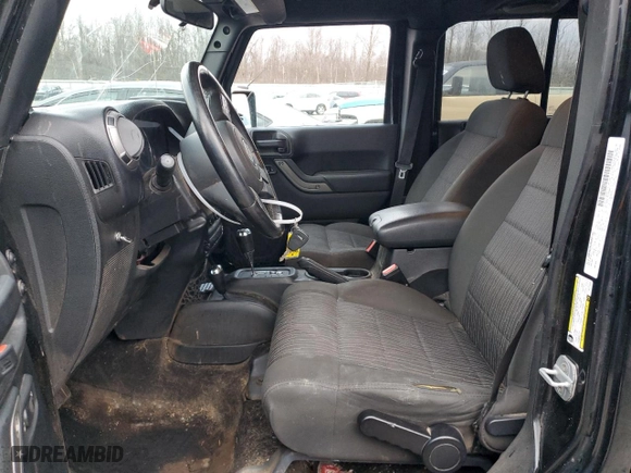 2012 Jeep Wrangler Unlimited Sport with VIN 1C4BJWDG2CL211414, listed as a Copart auction lot 83399674 with 165,617 mi miles and Non Repairable. Bid and sale history available at carsss.com. Image 7.