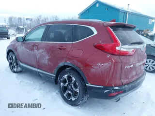 2018 Honda CR-V Touring with VIN 5J6RW1H95JL006062, listed as a IAAI auction lot 41072002 with 50,930 mi miles and . Bid and sale history available at DreamBid. Image 3.