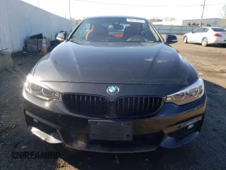 2019 BMW 4 Series 430i xDrive with VIN WBA4Z3C58KEF31811, listed as a Copart auction lot 50414074 with 55,807 mi miles and Salvage title. Bid and sale history available at DreamBid. Image 5.