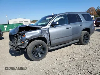 2020 Chevrolet Tahoe LS with VIN 1GNSCAKC4LR194911, listed as a Copart auction lot 83041644 with 118,716 mi miles and Salvage title. Bid and sale history available at DreamBid. Image 1.