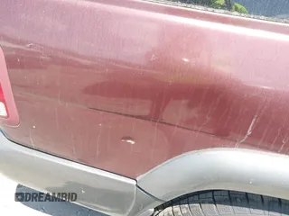 2001 Nissan Pathfinder SE z VIN JN8DR09Y21W584419, wystawiony jako IAAI lot #42133287 z przebiegiem 270 751 mil mil oraz . Historia ofert i sprzedaży dostępna na DreamBid. Obrazek 6.