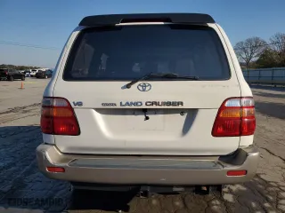 1999 Toyota Land Cruiser with VIN JT3HT05J8X0049750, listed as a Copart auction lot 77547144 with 168,435 mi miles and Salvage Title. Bid and sale history available at carsss.com. Image 6.