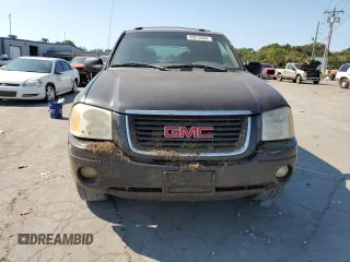 2004 GMC Envoy SLT with VIN 1GKDT13SX42423677, listed as a Copart auction lot 69012884 with Not Provided miles and Clean Title. Bid and sale history available at carsss.com. Image 5.