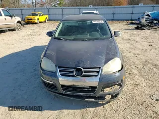 2010 Volkswagen Jetta S with VIN 3VWJX7AJ8AM007693, listed as a Copart auction lot 86056024 with 198,492 mi miles and Salvage title. Bid and sale history available at DreamBid. Image 11.