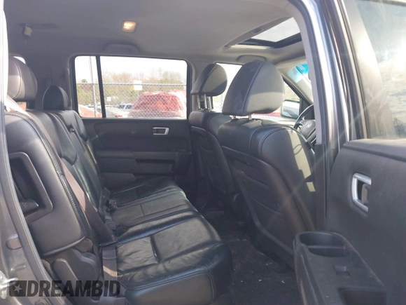 2011 Honda Pilot EX-L with VIN 5FNYF4H57BB107110, listed as a IAAI auction lot 42121356 with 300,169 mi miles and . Bid and sale history available at carsss.com. Image 8.
