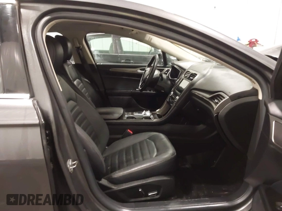 2018 Ford Fusion Energi SE with VIN 3FA6P0PU3JR203714, listed as a IAAI auction lot 41698507 with 168,609 mi miles. Bid and sale history available at carsss.com. Image 5.