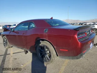 2021 Dodge Challenger GT with VIN 2C3CDZKGXMH611045, listed as a Copart auction lot 73009254 with 33,279 mi miles and Salvage Title. Bid and sale history available at carsss.com. Image 2.