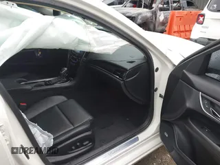 2013 Cadillac ATS z VIN 1G6AA5RX9D0156125, wystawiony jako IAAI lot #41964124 z przebiegiem 139 869 mil mil oraz . Historia ofert i sprzedaży dostępna na DreamBid. Obrazek 5.