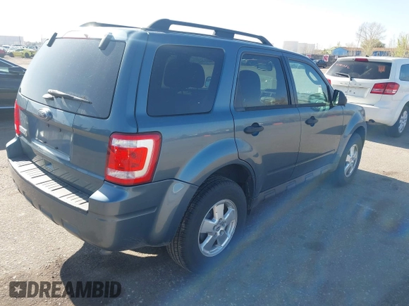 2011 Ford Escape XLT with VIN 1FMCU0D79BKB52998, listed as a IAAI auction lot 41980154 with 175,375 mi miles. Bid and sale history available at carsss.com. Image 4.
