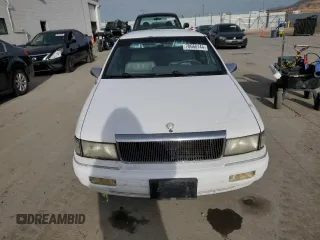 1994 Chrysler LeBaron z VIN 3C3AA563XRT225465, wystawiony jako Copart lot #78666144 z przebiegiem 87 254 mil mil oraz Tytuł czysty. Historia ofert i sprzedaży dostępna na DreamBid. Obrazek 5.