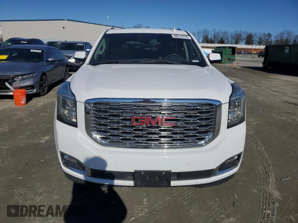 2019 GMC Yukon XL Denali with VIN 1GKS2HKJ2KR103446, listed as a Copart auction lot 88519755 with 77,779 mi miles and Salvage Title. Bid and sale history available at DreamBid. Image 5.