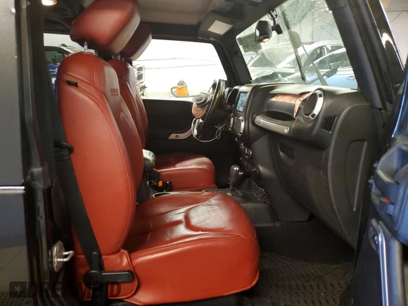 2013 Jeep Wrangler Rubicon with VIN 1C4HJWCG6DL666540, listed as a Copart auction lot 79337404 with 130,448 mi miles and Salvage title. Bid and sale history available at DreamBid. Image 10.
