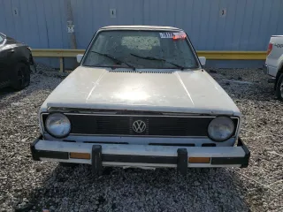 1984 Volkswagen Rabbit z VIN WVWCA0151EK009645, wystawiony jako Copart lot #78178084 z przebiegiem Nie podano mil oraz Tytuł czysty. Historia ofert i sprzedaży dostępna na DreamBid. Obrazek 5.