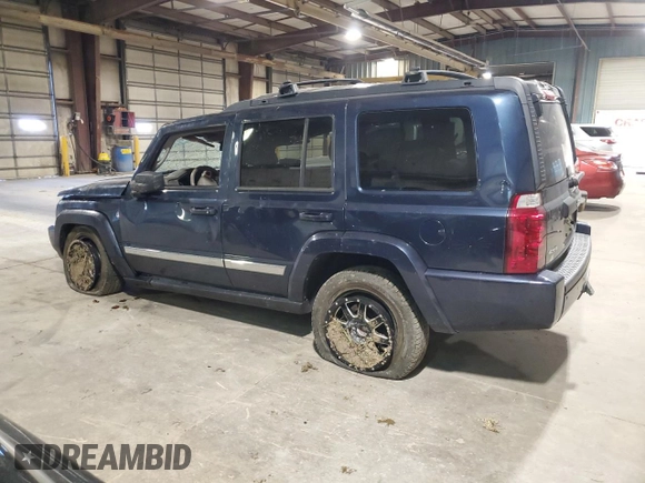2010 Jeep Commander Sport with VIN 1J4RG4GT7AC113206, listed as a Copart auction lot 56103825 with 174,306 mi miles and Salvage title. Bid and sale history available at DreamBid. Image 2.