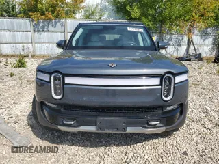 2023 Rivian R1S Adventure z VIN 7PDSGABAXPN010623, wystawiony jako Copart lot #72176294 z przebiegiem Nie podano mil oraz Szkody całkowita. Historia ofert i sprzedaży dostępna na DreamBid. Obrazek 5.
