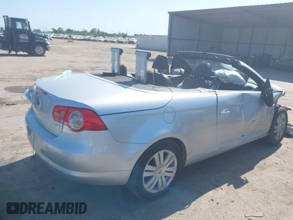 2009 Volkswagen Eos Komfort with VIN WVWBA71F39V020521, listed as a IAAI auction lot 42004648 with 50,885 mi miles and . Bid and sale history available at DreamBid. Image 4.