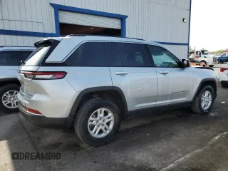 2023 Jeep Grand Cherokee Laredo with VIN 1C4RJHAG0PC674527, listed as a Copart auction lot 58538195 with 37,434 mi miles and Salvage title. Bid and sale history available at DreamBid. Image 3.