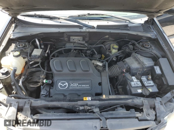 2002 Mazda Tribute LX with VIN 4F2YU09182KM12760, listed as a Copart auction lot 61292724 with 226,479 mi miles and Salvage Title. Bid and sale history available at carsss.com. Image 12.