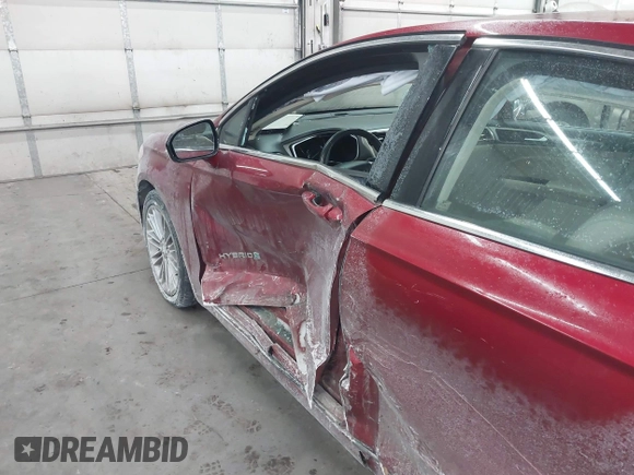 2014 Ford Fusion SE Hybrid with VIN 3FA6P0LU5ER136237, listed as a IAAI auction lot 41590088 with 174,009 mi miles. Bid and sale history available at carsss.com. Image 6.