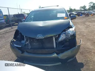 2014 Toyota Sienna XLE with VIN 5TDYK3DC6ES414892, listed as a IAAI auction lot 42545666 with 135,805 mi miles and . Bid and sale history available at DreamBid. Image 13.