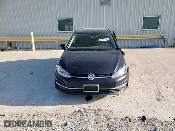 2018 Volkswagen Golf S z VIN 3VWG17AU1JM263597, wystawiony jako Copart lot #54077065 z przebiegiem 63 550 mil mil oraz Szkoda całkowita • Salvage title. Historia ofert i sprzedaży dostępna na DreamBid. Obrazek 14.