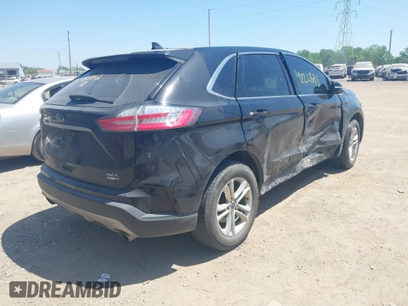 2019 Ford Edge SEL with VIN 2FMPK4J9XKBB03842, listed as a IAAI auction lot 42221645 with 155,424 mi miles and . Bid and sale history available at DreamBid. Image 4.