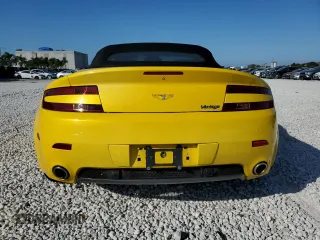 2009 Aston Martin Vantage z VIN SCFBF04C79GD12188, wystawiony jako Copart lot #45348405 z przebiegiem 29 580 mil mil oraz Szkoda całkowita • Salvage title. Historia ofert i sprzedaży dostępna na DreamBid. Obrazek 6.