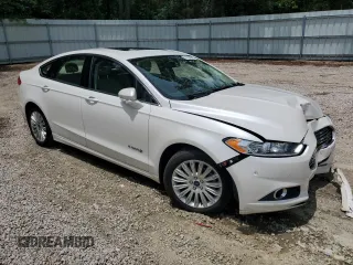 2015 Ford Fusion SE Hybrid with VIN 3FA6P0LU1FR210884, listed as a Copart auction lot 60035595 with 125,798 mi miles and Salvage title. Bid and sale history available at DreamBid. Image 4.