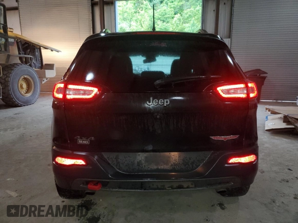 2016 Jeep Cherokee Trailhawk with VIN 1C4PJMBS7GW337774, listed as a Copart auction lot 55184885 with 161,567 mi miles and Salvage title. Bid and sale history available at DreamBid. Image 6.
