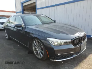 2019 BMW 7 Series 740i with VIN WBA7E2C52KB217153, listed as a Copart auction lot 65205835 with 61,981 mi miles and Clean title. Bid and sale history available at DreamBid. Image 4.