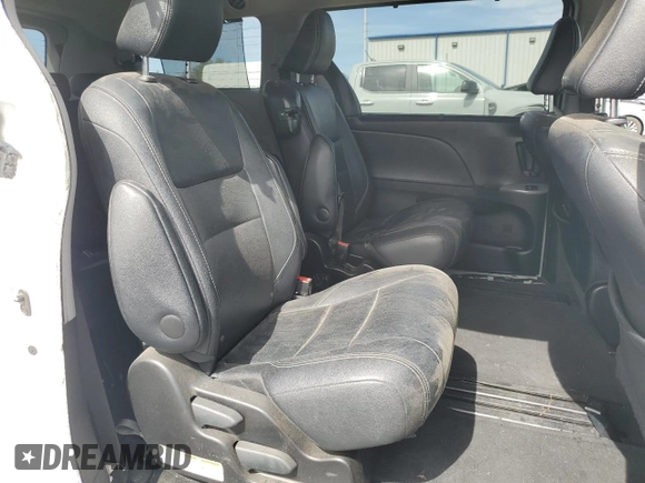 2015 Toyota Sienna SE с VIN 5TDXK3DC8FS582014, выставлен на аукционе Copart как лот 58018685 с пробегом 136 527 миль миль и Списание • Salvage title. История ставок и продаж доступна на DreamBid. Изображение 11.