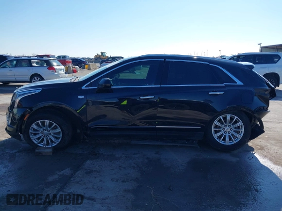 2019 Cadillac XT5 FWD with VIN 1GYKNARS7KZ117913, listed as a IAAI auction lot 41228767 with 105,335 mi miles and . Bid and sale history available at carsss.com. Image 14.