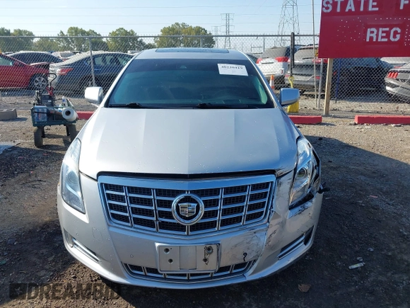 2013 Cadillac XTS Premium z VIN 2G61S5S30D9184910, wystawiony jako IAAI lot #40220419 z przebiegiem 111 330 mil mil oraz . Historia ofert i sprzedaży dostępna na DreamBid. Obrazek 12.