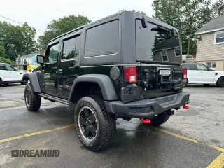 2015 Jeep Wrangler Unlimited Rubicon z VIN 1C4BJWFG2FL541572, wystawiony jako Copart lot #61723875 z przebiegiem 163 169 mil mil oraz Czysty tytuł • Clean title. Historia ofert i sprzedaży dostępna na DreamBid. Obrazek 2.