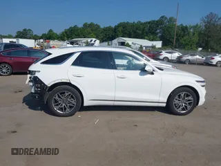 2023 Genesis GV70 2.5T with VIN KMUMADTB6PU096929, listed as a IAAI auction lot 42554427 with 73,553 mi miles and . Bid and sale history available at DreamBid. Image 13.