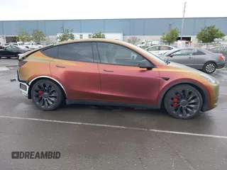 2023 Tesla Model Y Performance with VIN 7SAYGDEF4PF738885, listed as a IAAI auction lot 41798997 with 59,270 mi miles and . Bid and sale history available at DreamBid. Image 14.