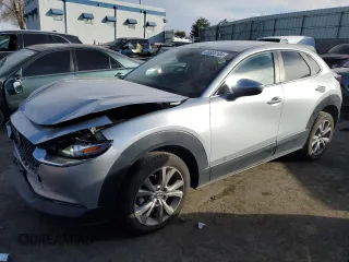 2021 Mazda CX-30 Select z VIN 3MVDMABLXMM247935, wystawiony jako Copart lot #86923104 z przebiegiem 67 563 mil mil oraz Szkoda całkowita • Salvage title. Historia ofert i sprzedaży dostępna na DreamBid. Obrazek 1.