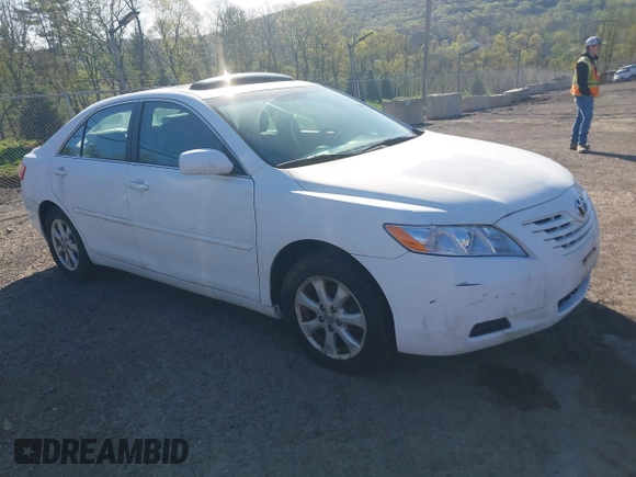 2009 Toyota Camry with VIN 4T1BE46K49U813806, listed as a IAAI auction lot 42141396 with 165,619 mi miles. Bid and sale history available at carsss.com. Image 1.
