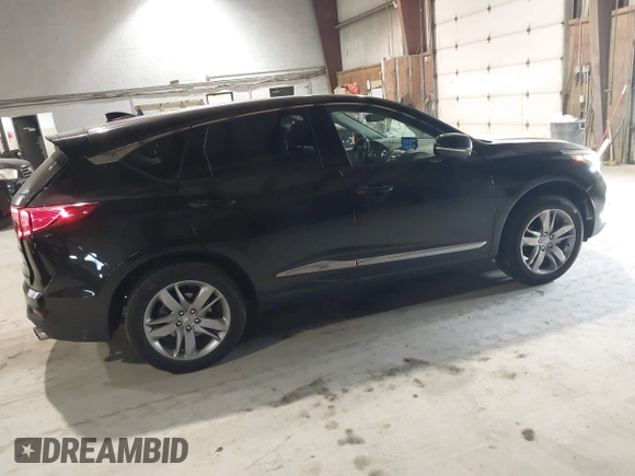 2021 Acura RDX w/Advance Package with VIN 5J8TC2H7XML030078, listed as a IAAI auction lot 41320663 with 74,478 mi miles. Bid and sale history available at carsss.com. Image 4.