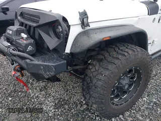 2014 Jeep Wrangler Unlimited Sahara with VIN 1C4BJWEG1EL127232, listed as a IAAI auction lot 41847368 with 109,975 mi miles. Bid and sale history available at carsss.com. Image 6.