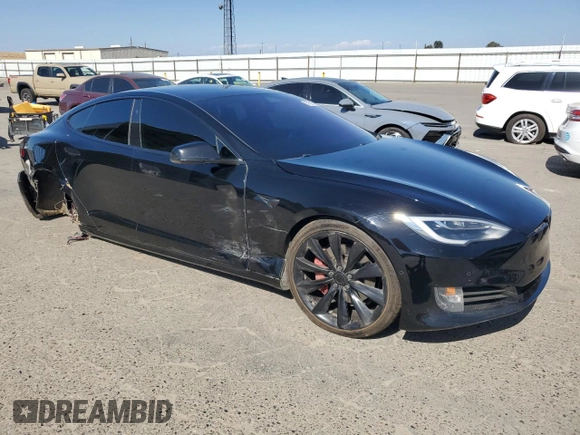 2018 Tesla Model S 75D с VIN 5YJSA1E27JF271596, выставлен на аукционе Copart как лот 57681565 с пробегом 106 710 миль миль и Списание • Salvage title. История ставок и продаж доступна на DreamBid. Изображение 4.