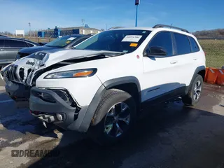 2018 Jeep Cherokee Trailhawk with VIN 1C4PJMBX7JD550173, listed as a IAAI auction lot 41094306 with 74,128 mi miles. Bid and sale history available at carsss.com. Image 2.