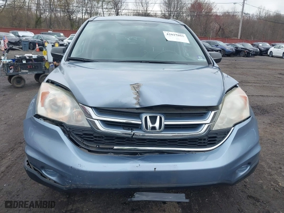 2011 Honda CR-V EX with VIN 3CZRE4H58BG704388, listed as a IAAI auction lot 42027055 with 89,543 mi miles. Bid and sale history available at carsss.com. Image 17.